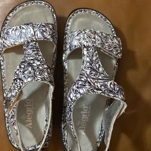 Womens Algeria New W/O tag, size 6.5 Blk n white in color . Leather sandal
